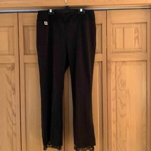 Lisette size 10 black super straight pants with lace detail at ankle.  Stretchy